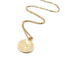 Crafting Your Story: The Magic Behind an 18k Gold Initial Necklace