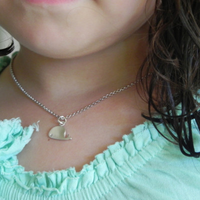 Personalized baby whale necklace in sterling silver with hand stamped round disc and birthstone