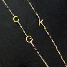 Your Story, Sideways: Crafting Our 18k Solid Gold Initial Necklaces