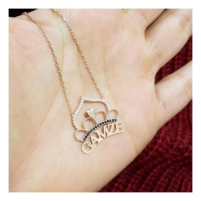 letter chain with crown on the top
