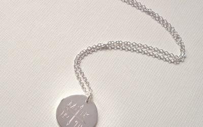 Your Engraved Monogram Arrows Necklace: A Story in Sterling Silver